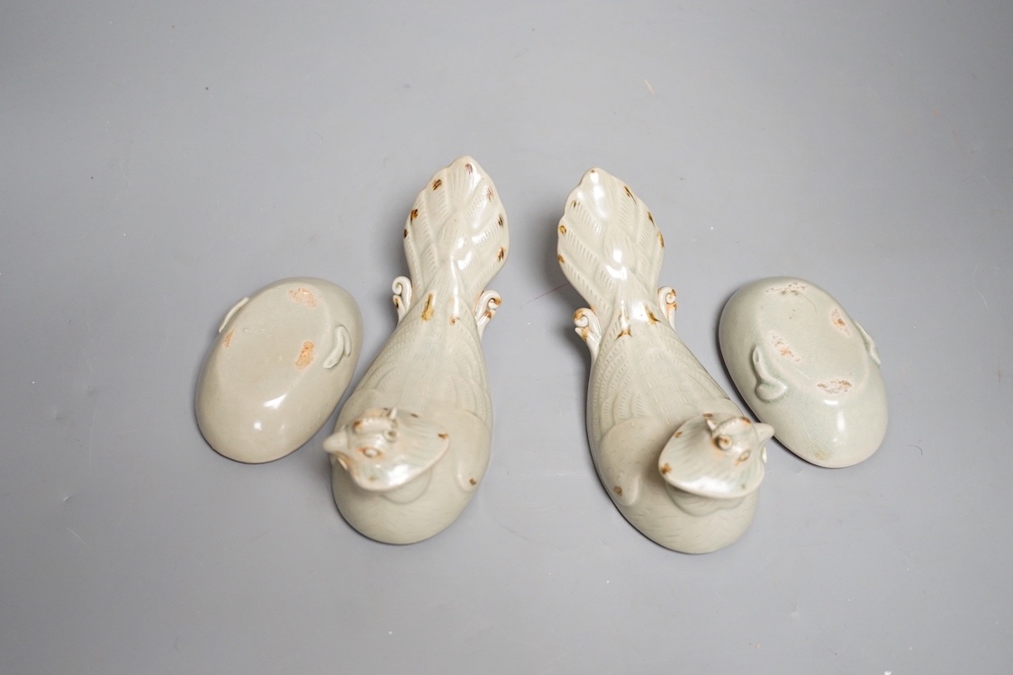 A pair of Chinese celadon glazed 'bird' vessels and covers 16cm